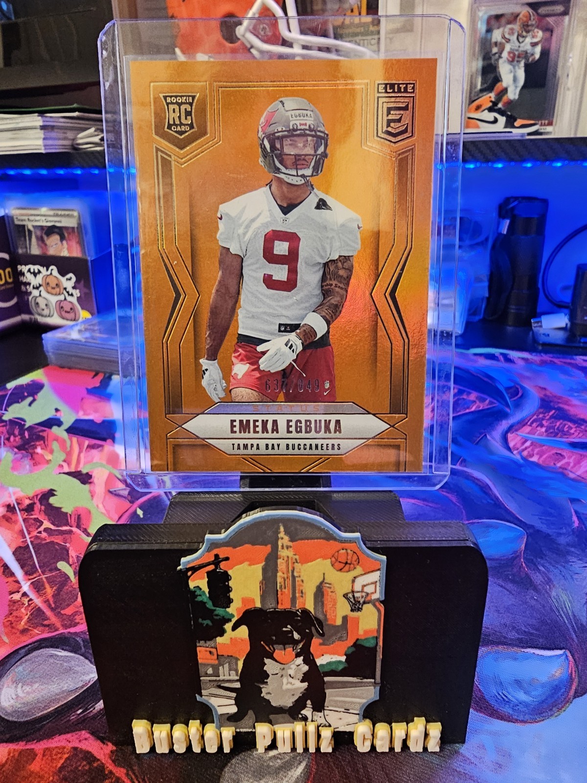 2025 Panini Donruss Elite Rookies Emeka Egbuka /849 Status Metallic Orange #102