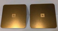 NEW Nespresso Set Of 2 Bronze Gold Coasters 25 Recycled Aluminum Cork Backed