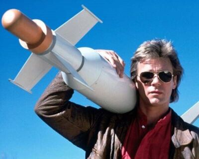 Richard Dean Anderson as MacGyver holding rocket on his shoulder 24x30 poster