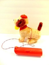 vintage battery operated toy dog wearing a beanie, made in Japan not working 