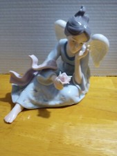 Glazed Porcelain Angle Figurine Hand Painted Blue/ White Pastel