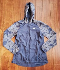 Nike Womens Full Zip Windbreaker Hoodie Jacket Small Blue Geometric Hi Low Hem