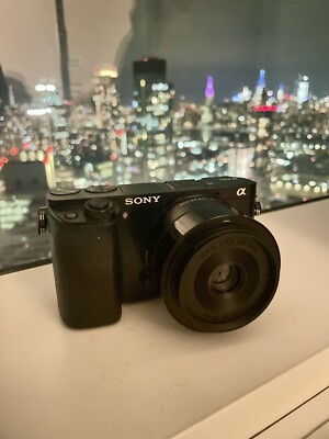 Mint[ Sony Alpha a6000 Camera with 30mm Sigma F2.8 DN Lens