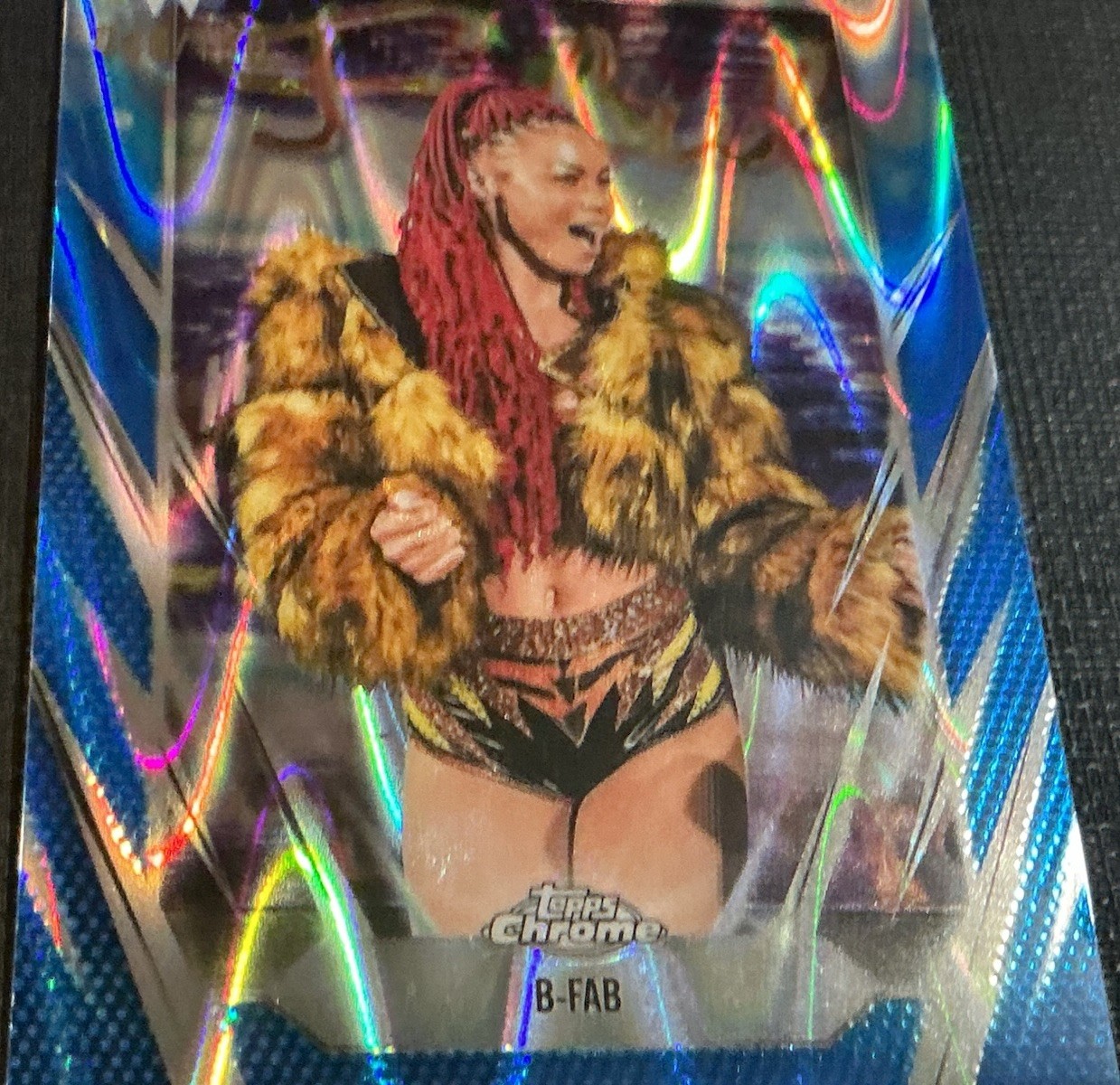2026 Topps Chrome WWE B-Fab #143 Blue Refractor 046/150