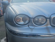 2007 Jaguar X type 2.5L Driver side Headlight