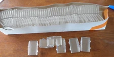 (50) COUNT LOT OF NEW 2" X 1" X 1/2" HARD PLASTIC HINGED SNAP CASES PC-1