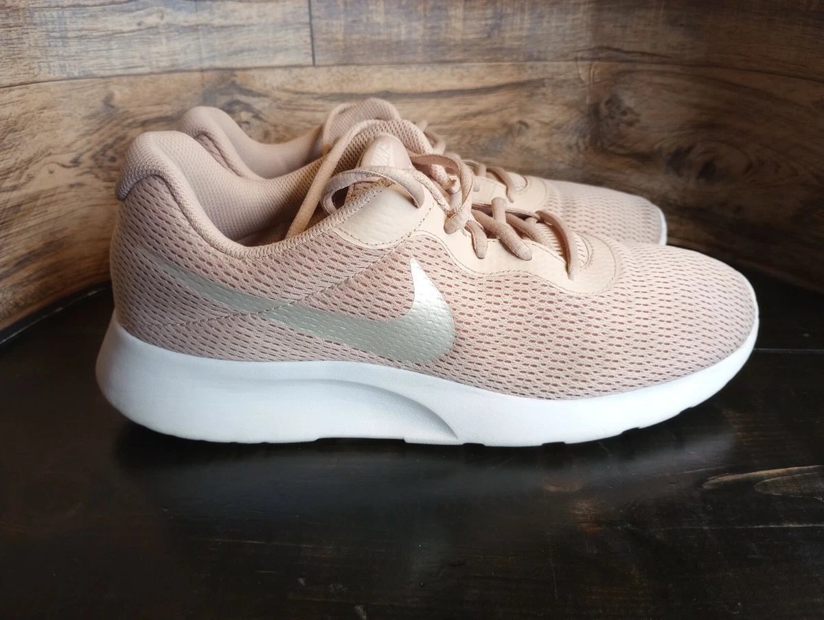Nike tanjun pink sale