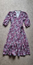 Image of Yumi Green Daisy Print Wrap Midi Dress in Pink