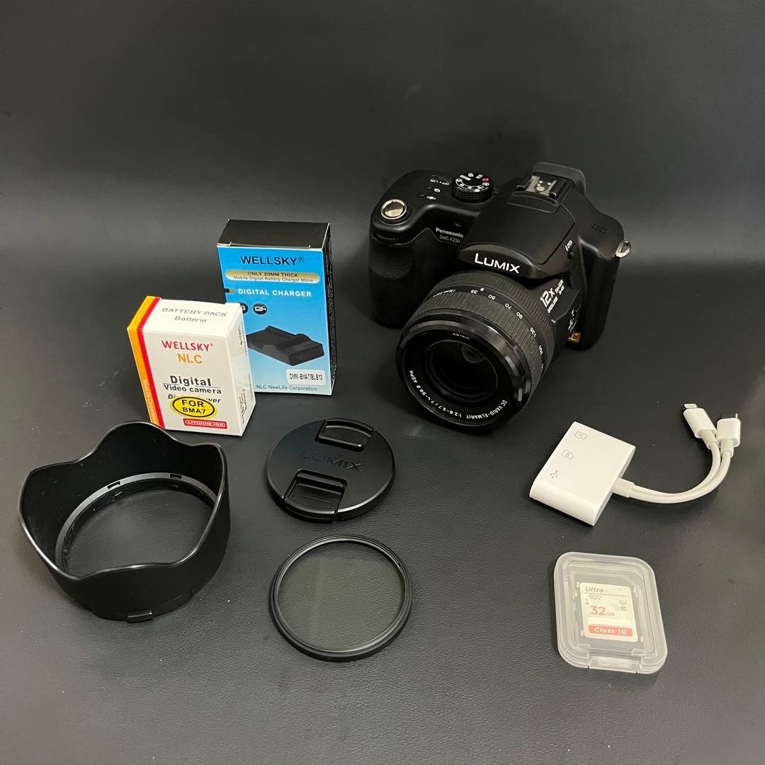 Panasonic LUMIX DMC-FZ50 Camera with Leica Lens and Smartphone