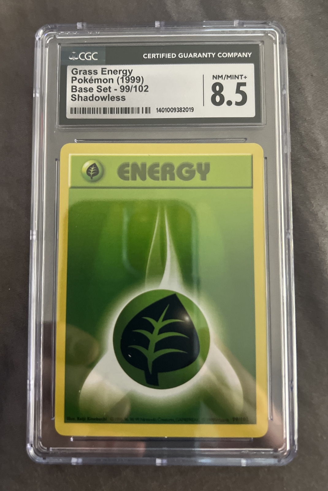 Grass Energy Pokemon Base Set Shadowless 99/102 1999 CGC 8.5 NM/MT+