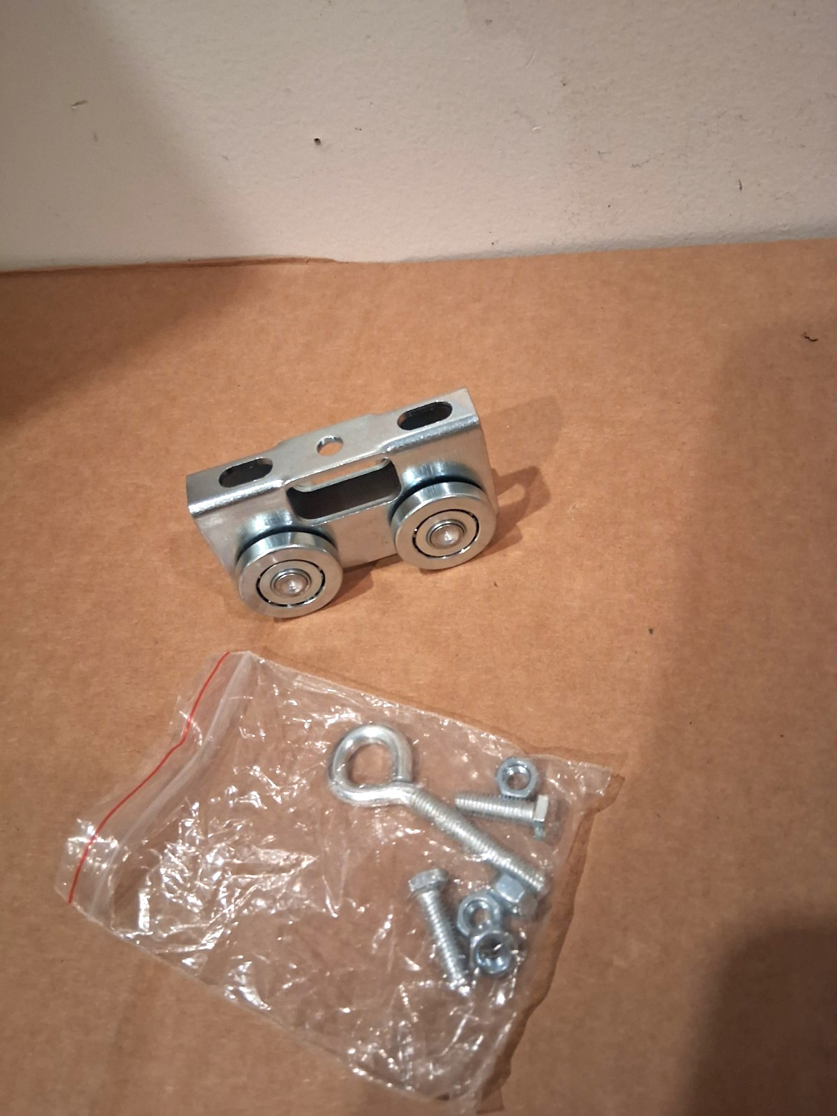 NEWHOUSE 1-5/8" in. Strut Channel 4-Wheel Trolley Assembly with Eye Loop