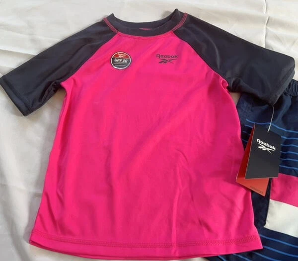 Reebok niño 2 piezas Juego de Natación Talla 6 NUEVO Rashguard Láser Rosa Azul Marino Foto 3 de 4