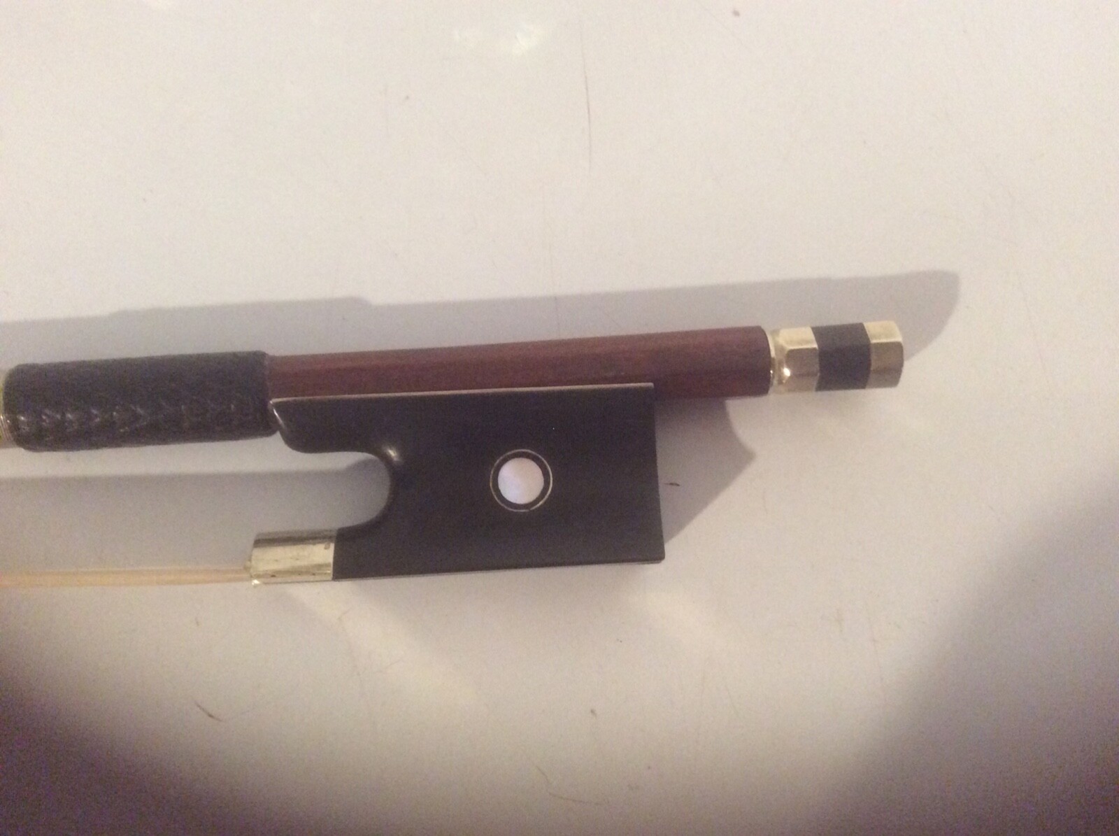 Violin bow Ludwig Bausch 18051871, pernambuco, round, silver winding