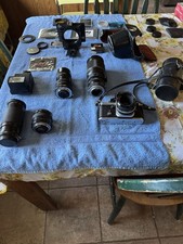 Nikon Black SLR Film Camera with Nikkor 50mm Lens, Accessories, Extra Lenses