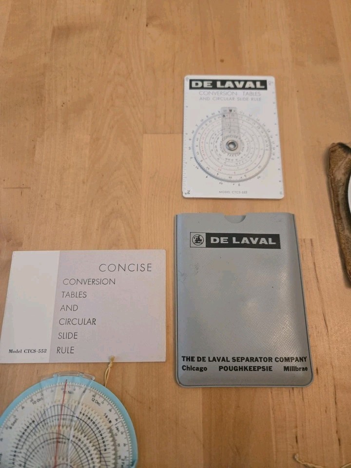 A De Laval circular slide rule — a branded industrial tool made for a specific company's conversion tables, making it a rare piece of corporate engineering history.