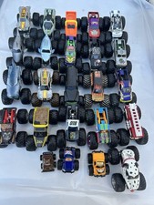 Lot of 21 vehicles (size 1:64) - Hot Wheels Monster Jam trucks.