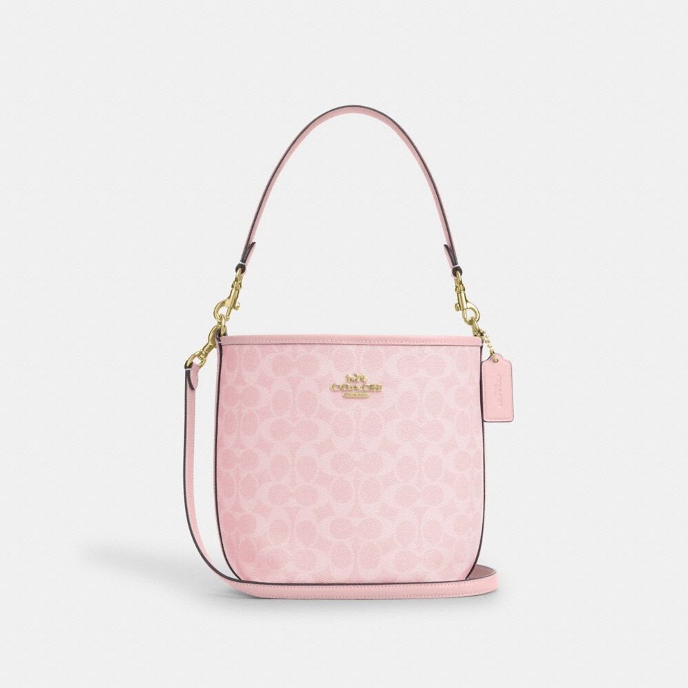 NWT Coach City Bucket Bag In Signature Canvas with bow / floral NWT Coach City Bucket Bag In Signature Canvas with bow / floral