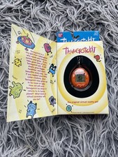 NIB Bandai Original TamaGotchi Orange and Green letters, 1996 - 1997 English