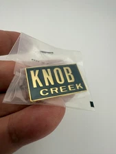 Knob Creek Bourbon Whiskey Promotional Pin - Gold Tone with Black Background
