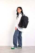 B IS 'The Backpack' in Black Canvas Leather Black Carry