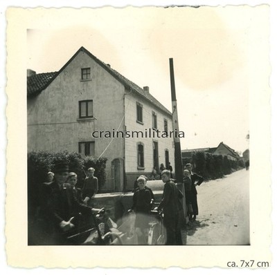 Genuine Photo population looking at advance 14th ID at border barrier Holland 1940