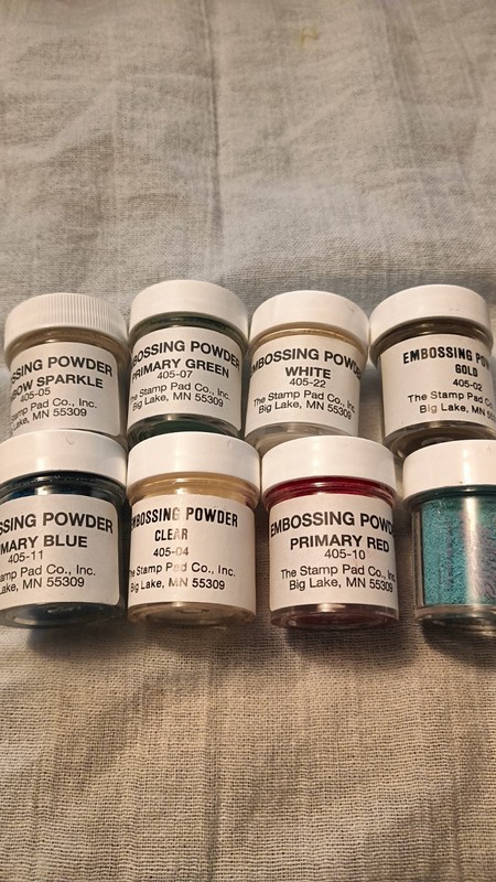 8 Containers Of Embossing Powder Red,2 Blues, Green, White, Gold,Clear,Rainbow +