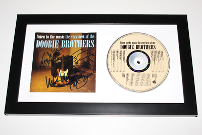 DOOBIE BROTHERS SIGNED FRAMED THE GREATEST HITS CD COVER BOOKLET