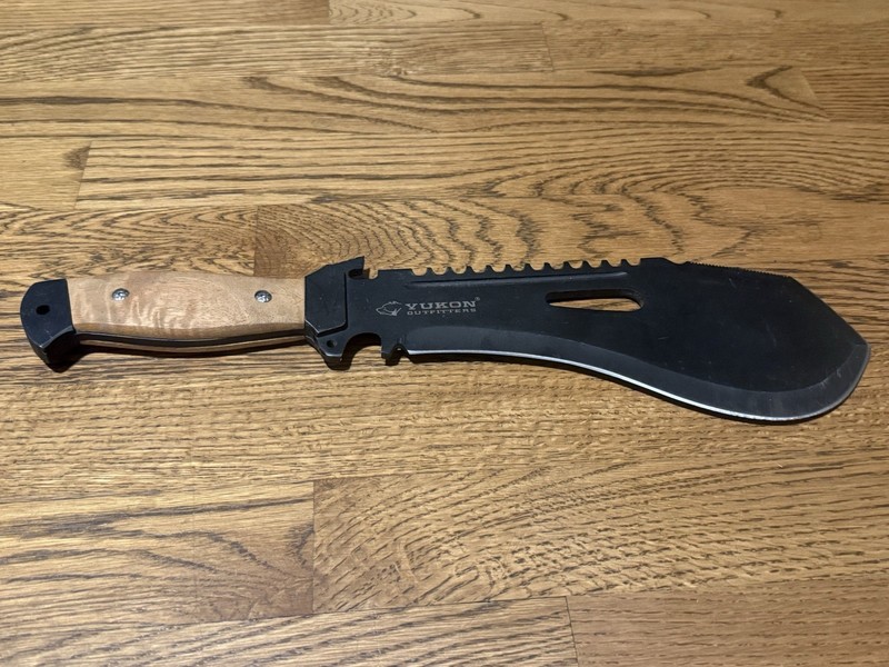 Yukon Outfitters bolo survival machete w/ a black coated blade, a sawback spine