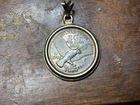VINTAGE SILVER ISSUE EAGLE 2 GRAM  .999 SILVER ROUND SET IN PENDENT