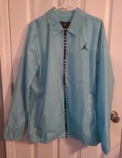 Nike Air Jordan Essentials Men s Size Medium Woven Jacket Aqua Black DX9687-464