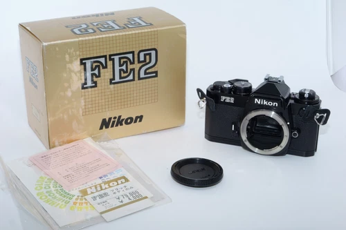 Nikon FE2 35mm SLR Film Camera Body. BLACK. BOXED. Mint Condition!