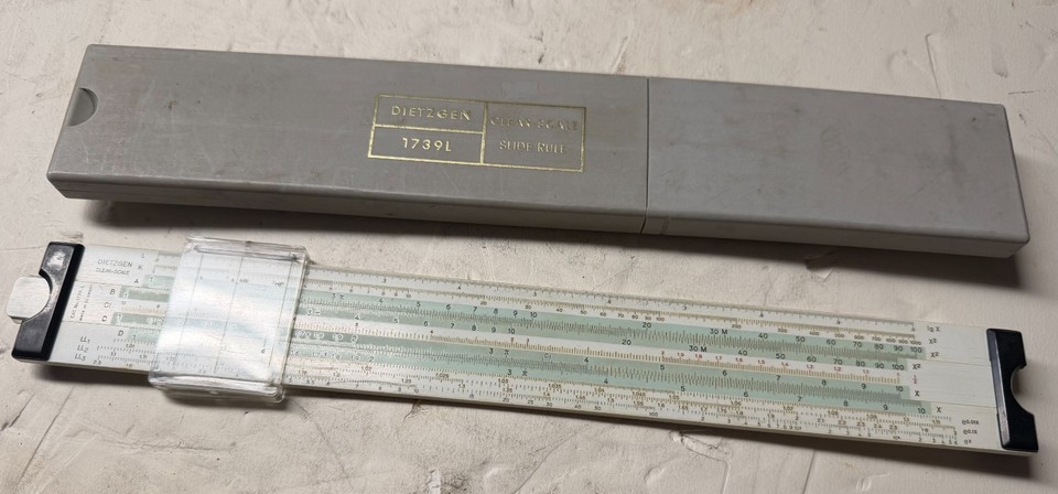 A precision Dietzgen Clear-Scale Duplex slide rule made in Germany with its original case — a serious engineering artifact in excellent vintage condition.