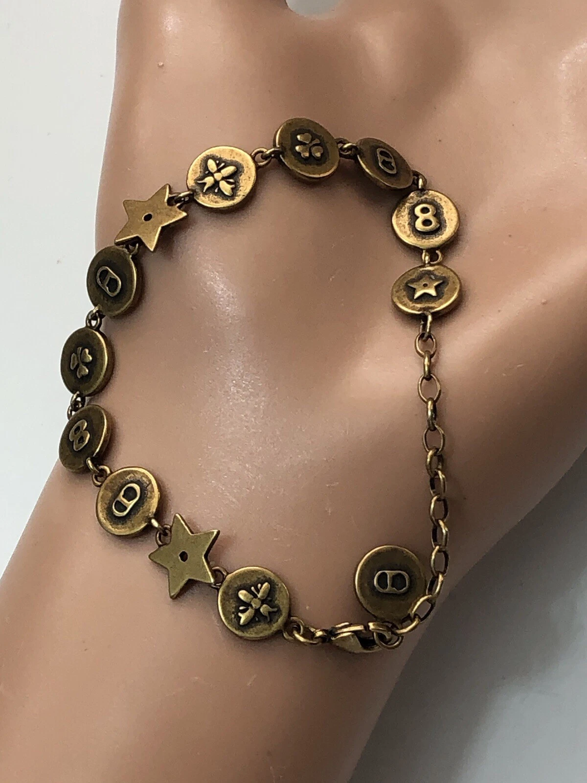 Amulettes d'amour Christian Dior breloques ronds et de départ laiton vintage 7 pouces