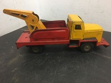 Vintage 1950s Japanese Tow truck tin toy orange  red Rubber wheeled tow chain