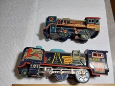 2 VINTAGE TIN TRAINS - LOCOMOTIVES - SWALLOW & FEATHER HORSE