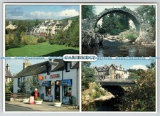 L393384 Carrbridge Iverness Shire Village Scene Carrbridge Hotel Village Stores