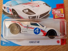 Hot Wheels Ford GT-40 White With Red & Blue Markings Number 4. Scale 1:64.