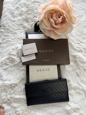 Gucci Black Embossed Logo Pattern Folding Women's Wallet with Credit Card Slots