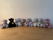 8 Charlie Bears Travel Buddies.