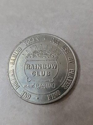 $1 gaming token from the Rainbow Club and Casino located in Henderson, Nevada