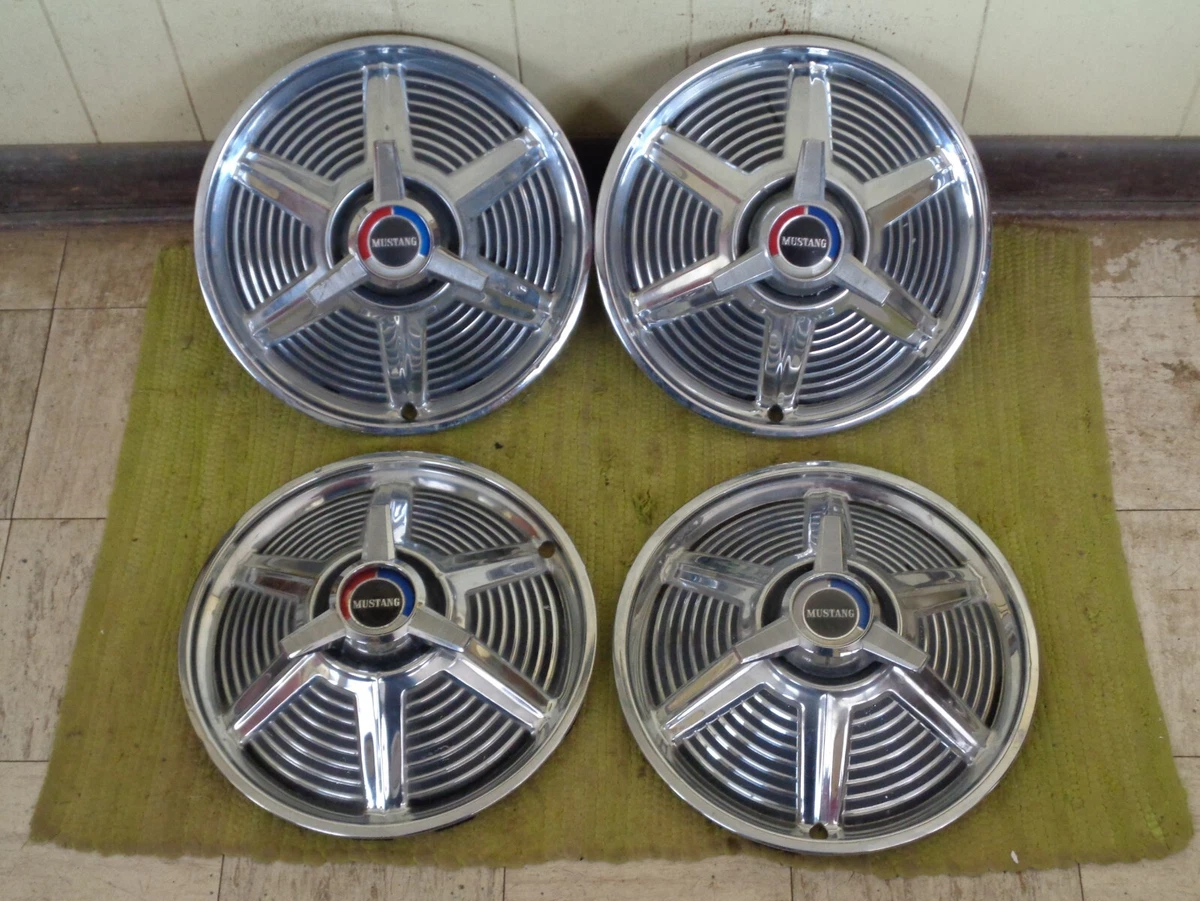 1965 mustang spinner hubcaps deals