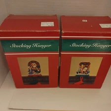 Set Of 2 Santa Stocking Hangers See Pictures for wear and repair. X1