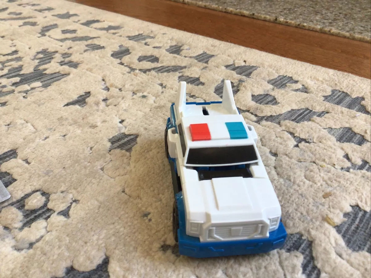 Police car transformer toy name deals