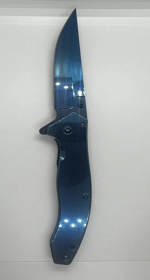 CUCHILLO DE APERTURA ASISTIDA POR RESORTE 4,5” ARCO IRIS ACABADO TITANIO HOJA DE ACERO INOXIDABLE Foto 3 de 4