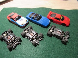 Vintage HO slot car lot as is. 3 Bodies 3 chassis with motors