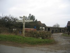 Roadsign at Appletree Another of the older style roadsigns that c2006