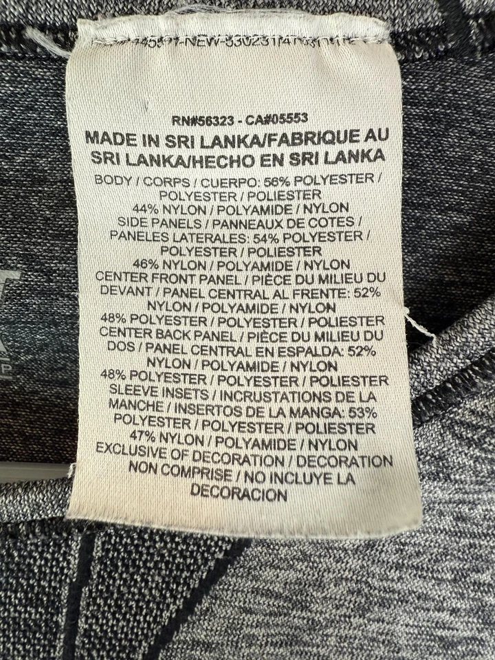 Camiseta deportiva Nike Dri-FIT para mujer XS gris manga larga para correr agujeros para los pulgares Foto 3 de 4