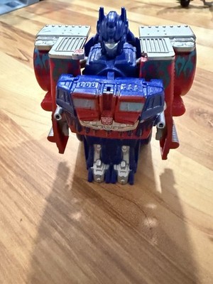 Hasbro Transformers Quick Change Optimus Prime Michael Bay Flames 2008