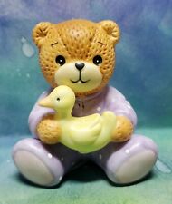 Enesco Lucy and Me Lucy Rigg Bear in purple pj's with yellow duck