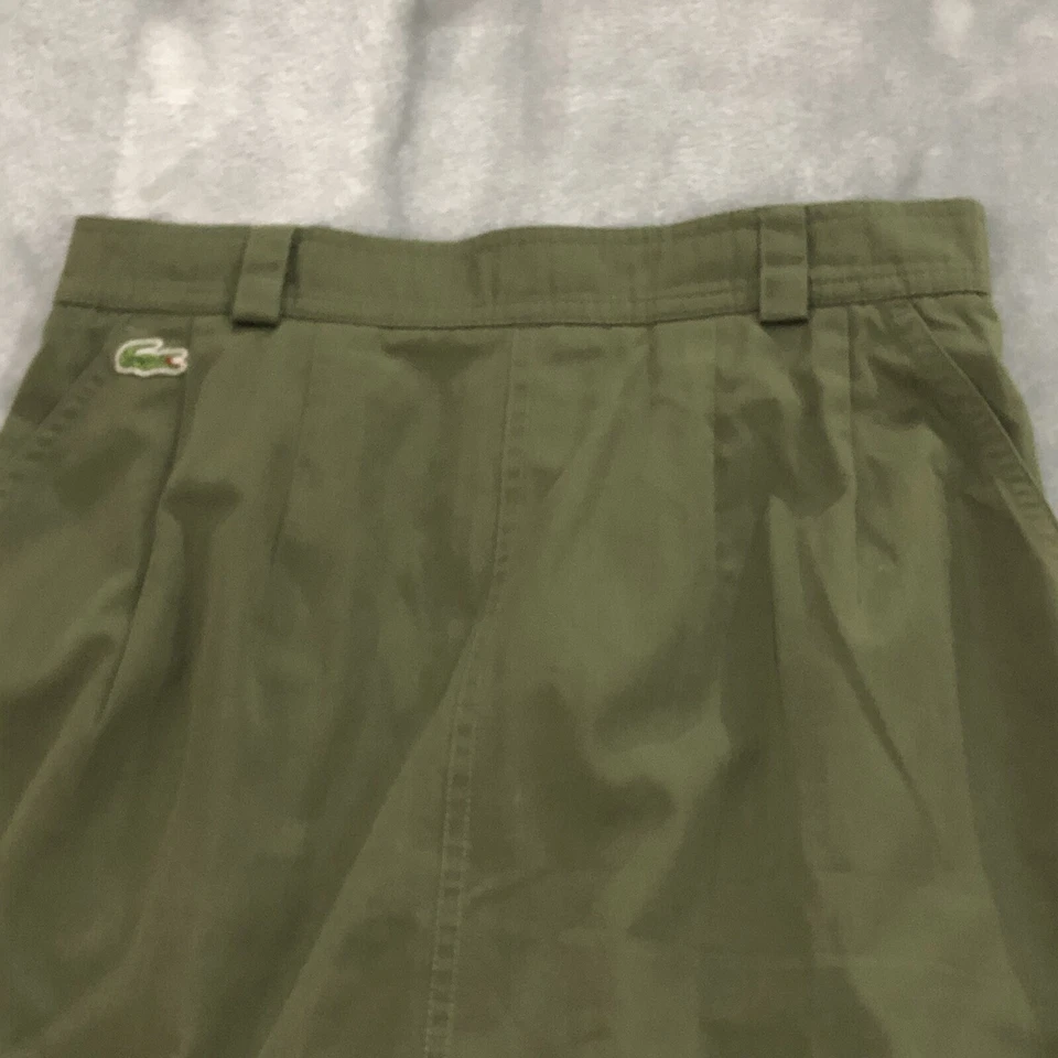 Falda midi Chemise Lacoste vintage rara etiqueta 10 se adapta a 6 verde oliva hecha en Aust Foto 2 de 4